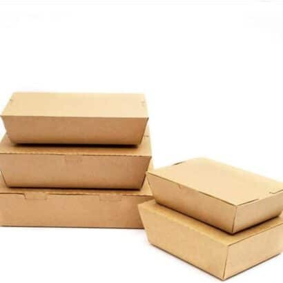 Stack of premium leak-proof brown kraft paper takeaway lunch boxes